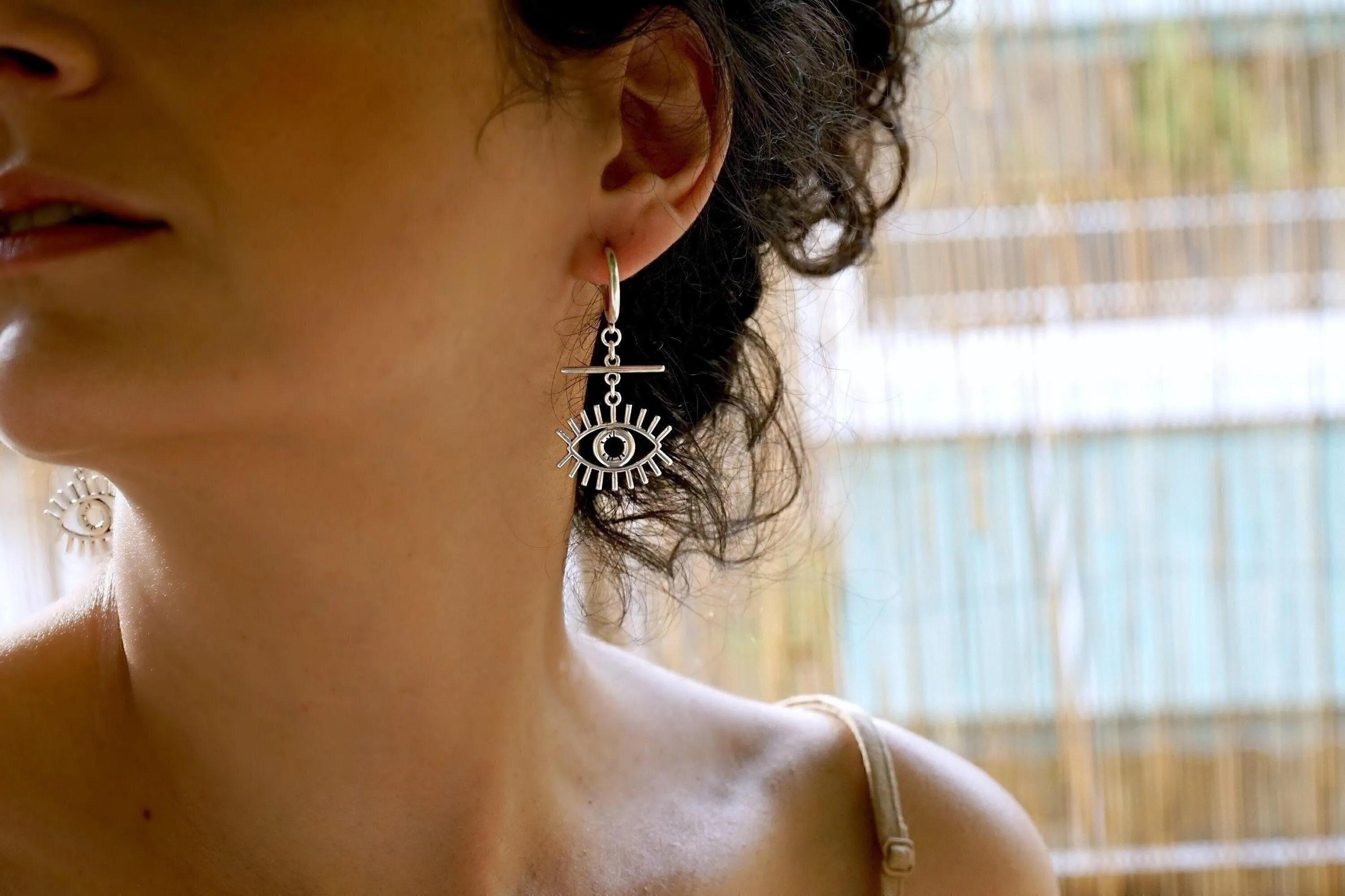 Long Silver Hoop Earrings with Evil Eye Charm